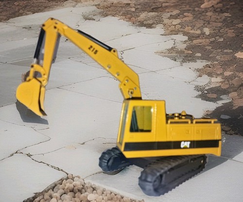 Löffelbagger cat 215 - cat,