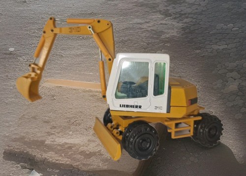 Löffelbagger liebherr 310 - liebherr,
